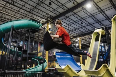 Boy launching through the air