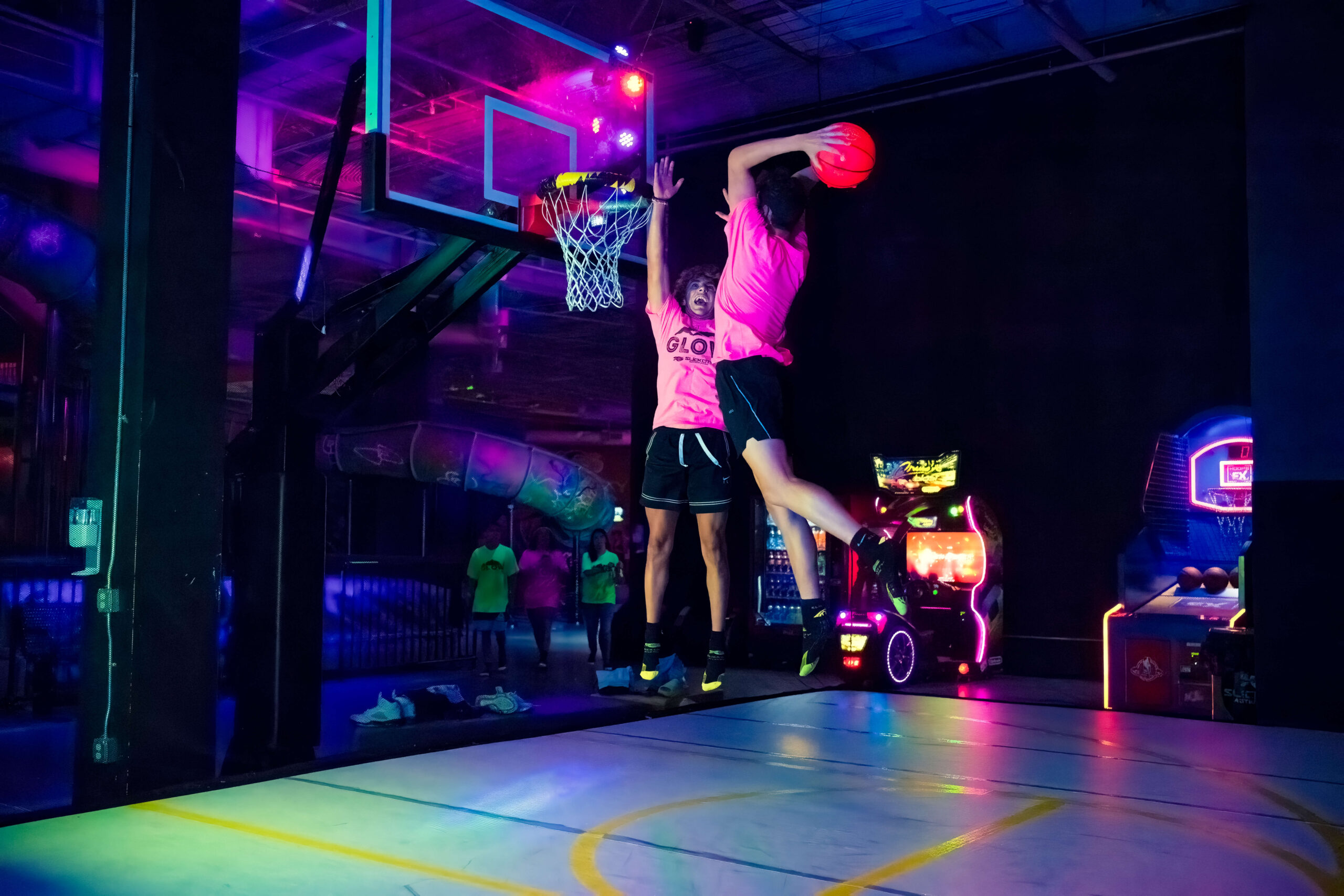 teens playing indoor hoops